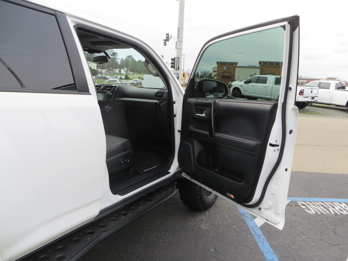 2019 White /BLACK Toyota 4Runner TRD Pro (JTEBU5JR3K5) with an 4.0L V6 engine, 5 -Speed Automatic transmission, located at 2630 Grass Valley Highway, Auburn, CA, 95603, (530) 508-5100, 38.937893, -121.095482 - Features Ironman 4X4 suspension, BFG tires, Rockslider, Roof rack, window tint, and interior Rago Fab Molle storage racks. - Photo#39